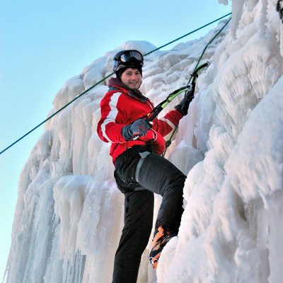 man ice climbing