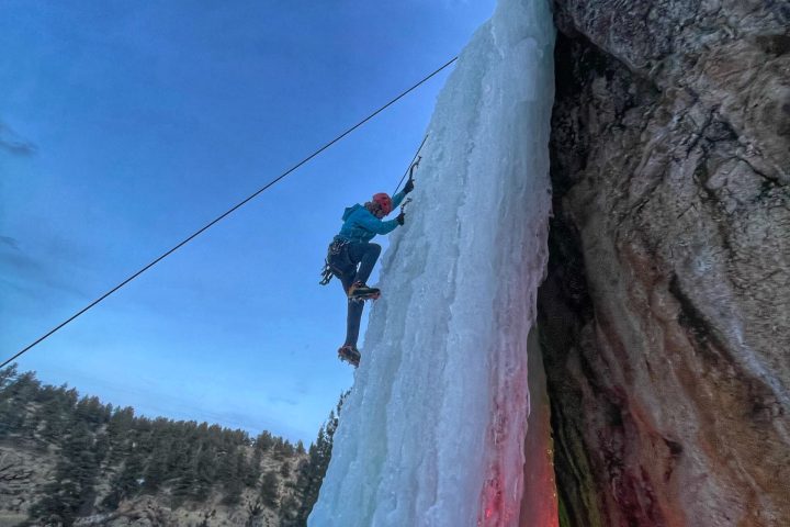 a large waterfall over a fire