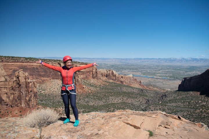 a person walking down a dirt road