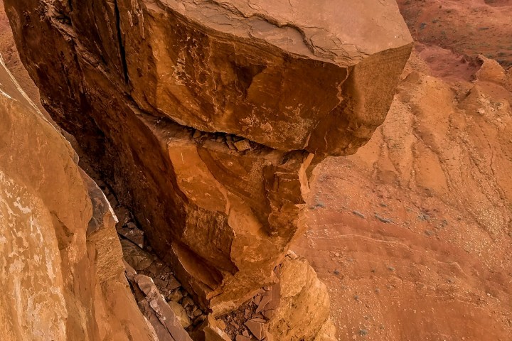 a fire hydrant on the side of a mountain