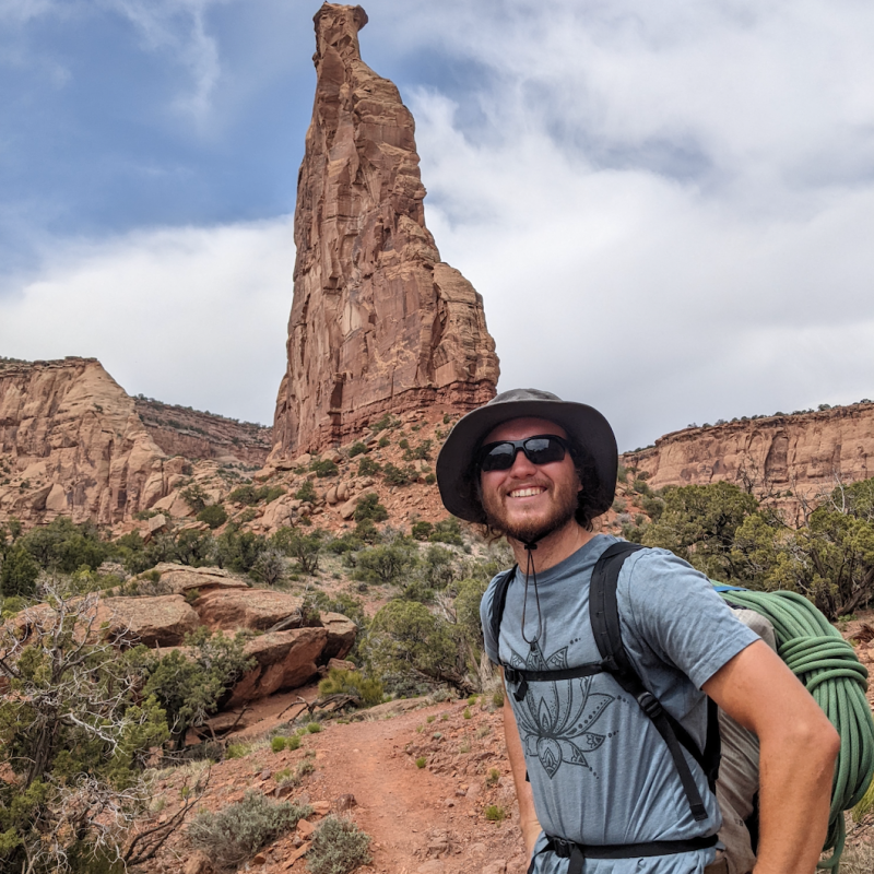 a man sitting on a rock