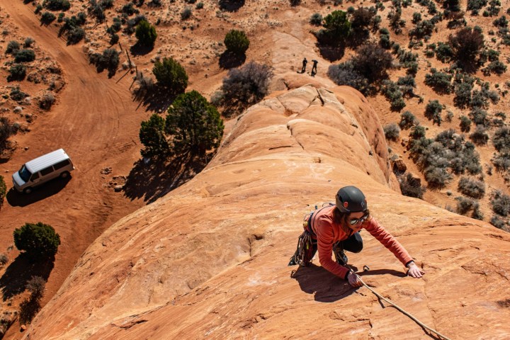 a couple of people that are standing in the dirt