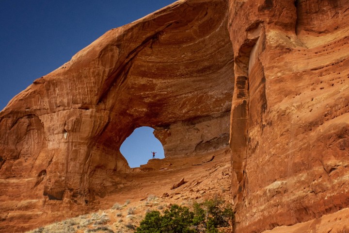 a canyon with Arches National Park in the background